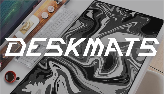 Nevraa anime desk mat with black and white swirl design on a modern gaming desk