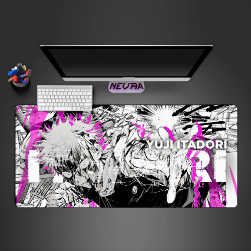 Anime desk mat featuring Yuji Itadori graphic, black and white with pink accents, on gaming setup